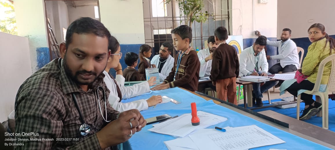 Check up of patients being done by students from Mahatma Gandhi Homoeopathic Medical College in a medical camp.