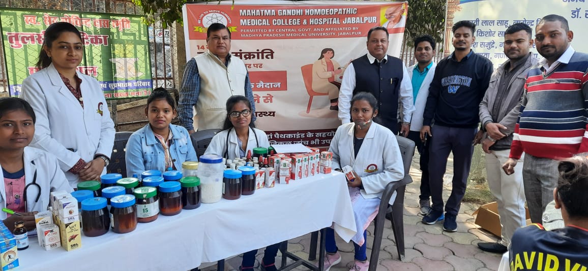 Check up of patients being done by students from Mahatma Gandhi Homoeopathic Medical College in a medical camp.