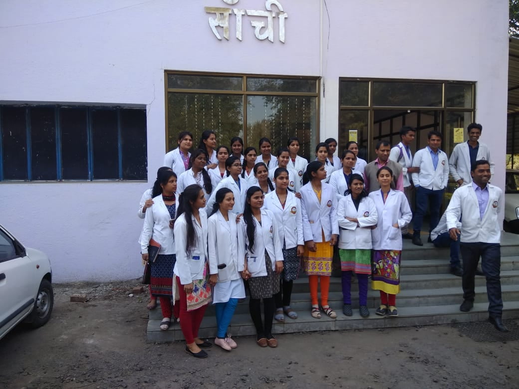 Check up of patients being done by students from Mahatma Gandhi Homoeopathic Medical College in a medical camp.