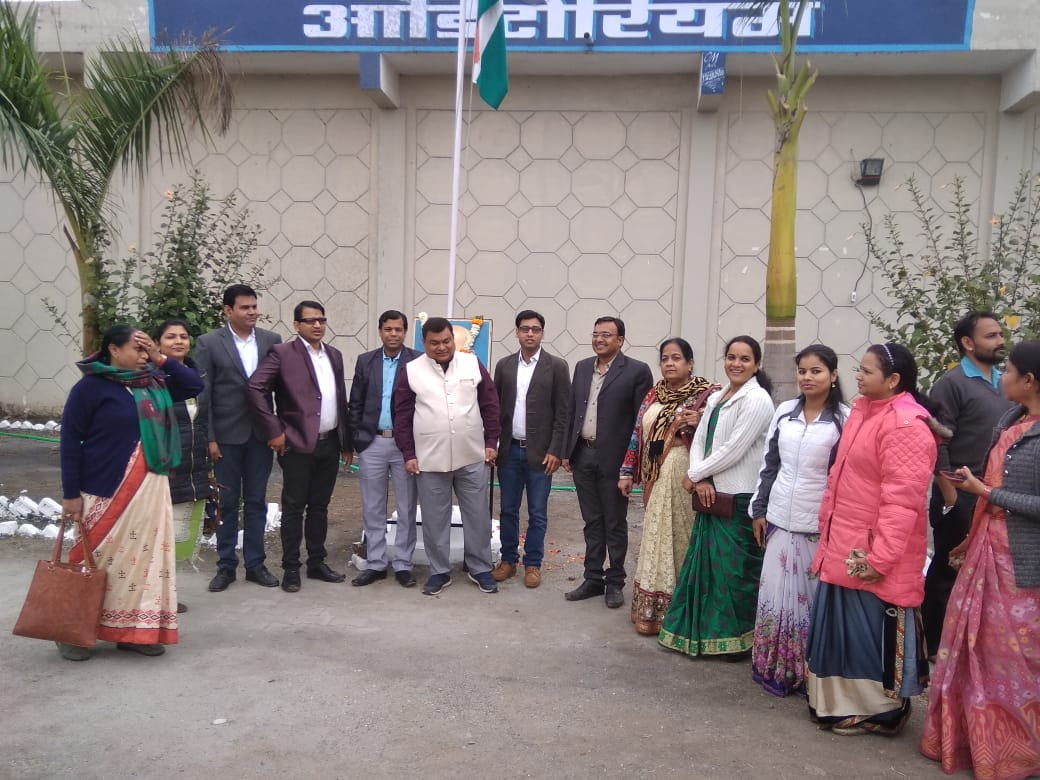 A photograph of staff of Mahatma Gandhi Homoeopathic Medical College taken during a medical camp